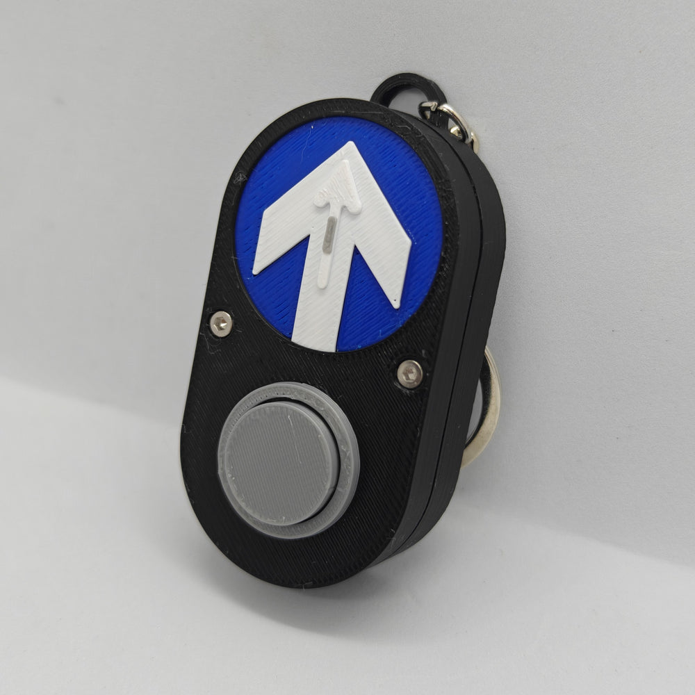 3D printed Sydney pedestrian crossing button keychain, a pocket-sized replica of the real crossing button